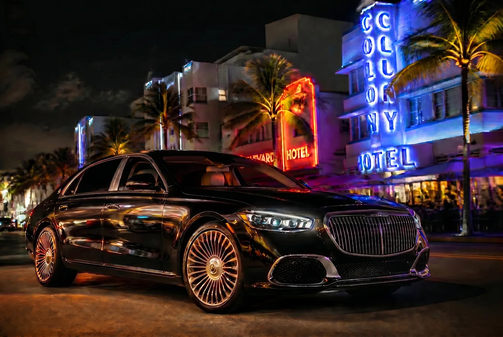 Black luxury chauffeured sedan at night in Miami Beach